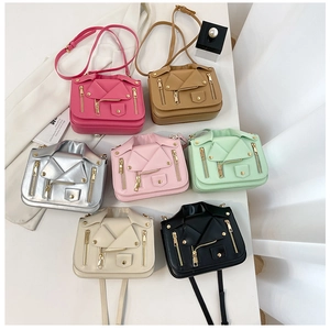 Detailed overhead view of various colored motorcycle jacket style PU leather crossbody bags
