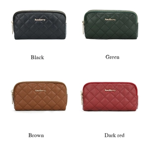 Quilted faux leather clutch purses in black, green, brown and dark red colors