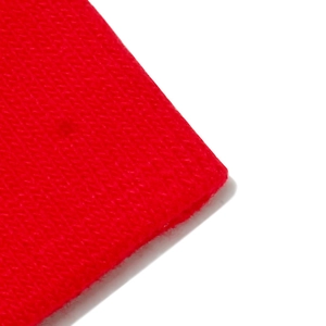 Close-up of bright red knit texture and premium weaving detail on beanie hat
