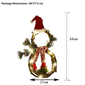 Detail of LED snowman Christmas wreath with pine cones and size dimensions 54x21cm