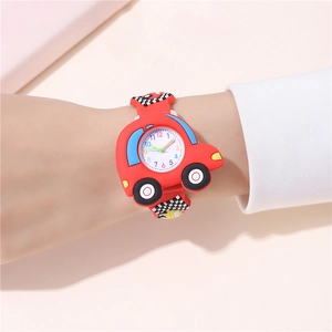 Close-up of red car-shaped children watch with checkered silicone strap on wrist