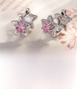 Detail of star hoop earrings with 6mm inner diameter and pink zircon stone inlay