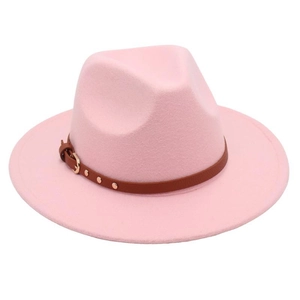 Detail of pink wool fedora hat featuring a brown faux leather belt with a gold buckle
