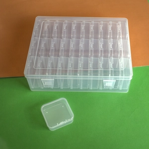 Set of clear plastic storage boxes with multi-compartment dividers and locking latches