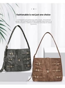 Detail showing two vintage motorcycle-style tote bags with multiple metal buckles