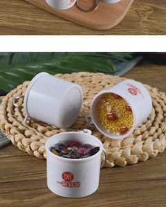 Detailed macro view of realistic congee food model charms with red Chinese characters