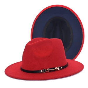 Stylish two-tone red and navy wool fedora hat with gold buckle detail for detail view.