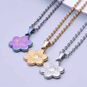 Three flower pendants in gold silver and rainbow finish with delicate O-chains