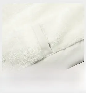 Detail display of warm fleece lining and sturdy inner pocket stitching on jacket
