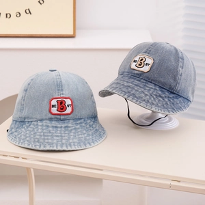 Close-up of light blue denim fisherman hat with B letter embroidery for kids