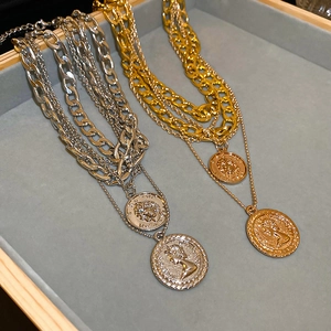 Chic multi-layer metallic portrait coin pendant necklace with heavy gold curb chain style