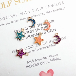Set of 6 gold alloy celestial charms with star and moon oil-drop designs for DIY jewelry