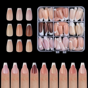 French tip nail set in nude and brown shades with transparent 9-compartment storage case