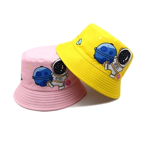 Kids cartoon astronaut sun hats in pink and yellow cotton fabric with planet prints