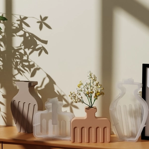 Moules en silicone pour vases rayés pour moulage en résine avec vases à fleurs finis