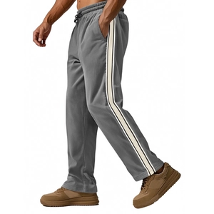 Men's loose corduroy sports trousers in dark grey with side stripes and drawstring waist