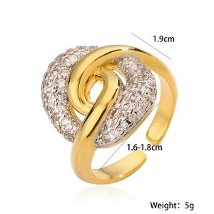 Golden irregular geometric open ring with white zircon pave setting in crossover design