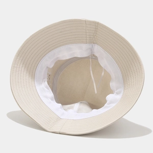 Beige cotton bucket hat for men and women featuring inner adjustable drawstrings