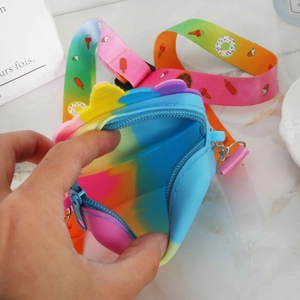 Detail view of rainbow silicone purse interior with colorful printed nylon strap