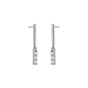 Detailed view of silver drop earrings featuring a sleek vertical bar and three round gems