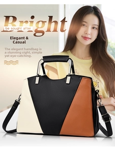 Detail of tricolor tote bag with lychee texture and silver U-shaped metal handles
