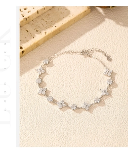 Detail of S925 sterling silver four-leaf clover bracelet with sparkling zircons