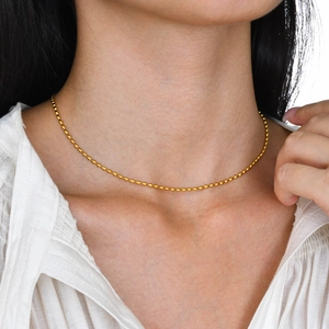 Chic 3/5mm gold titanium steel olive bead necklace worn on neck for a layered look