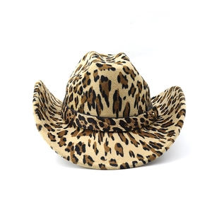 Detail of leopard print western cowboy hat featuring soft suede texture and gold rivet