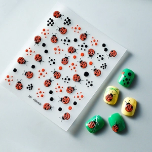 5D embossed ladybug nail stickers with raised textures and decorative black dots detail