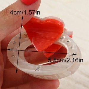 Red heart geometric hair claw clip with rhinestones and striped texture measurements