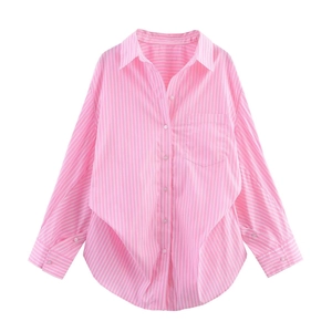 Detail of pink and white striped long sleeve shirt with a single chest pocket and buttons