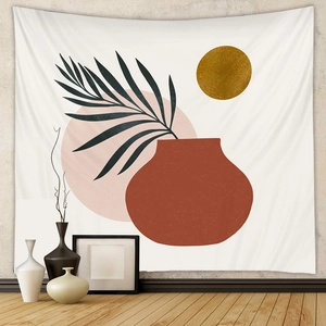 Bohemian abstract wall tapestry with palm leaves and terracotta pottery in a modern room