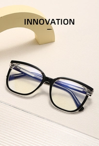 Detail of blue light blocking glasses 5731 showing hinge and size parameters on temple