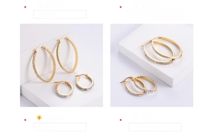 Detailed view of gold plated oval and round hoop earrings set with sparkling zircon pavé