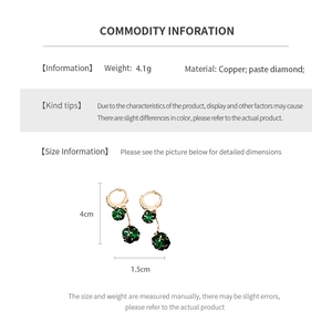 Detail showing 4cm emerald tassel earrings with gold plating and size measurements