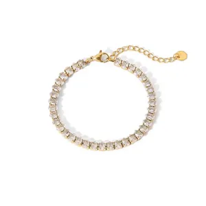 Detail of 18K gold plated stainless steel bracelet with zircon stones and extender chain