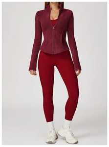 Detailed view of burgundy high-stretch fleece-lined sports set with zip-up jacket and leggings