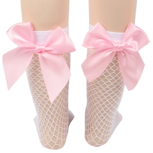 Close-up of white mesh socks featuring large pink satin bows on a model with white background