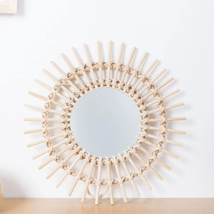 Bohemian sunflower-shaped rattan wall mirror with handcrafted woven wood frame