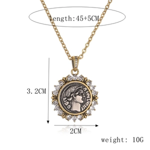 Detailed view of vintage gold coin necklace with size specs and rhinestone pendant