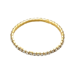 Elegant gold tennis bracelet with a single row of white cubic zirconia on white background
