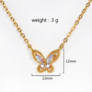 Gold plated butterfly necklace with blue and purple crystals on a clean white background