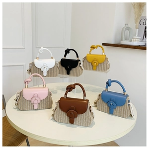 Selection of six colorful woven handbags featuring unique knotted handles and metal buckles