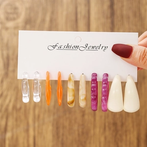 Detailed set of 5 pairs of geometric resin hoop earrings in assorted vibrant colors
