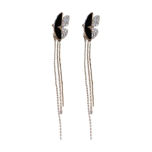 Elegant butterfly tassel clip-on earrings with black and white rhinestones and gold chains