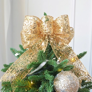Sparkling champagne gold sequined bow topper for Christmas tree festive decoration