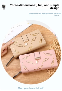 Detail of hollow leaf patterns and leaf-shaped metal pendants on elegant wallets