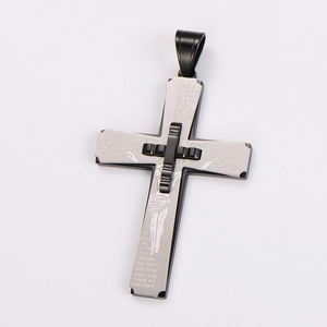 Detail of layered cross pendant with Spanish Lord's Prayer and Jesus silhouette engraving