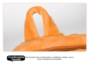 Close-up of the comfortable plush handle and durable zipper on the orange dinosaur backpack
