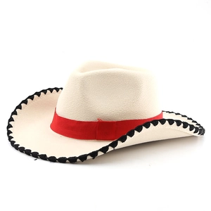 Detailed view of beige wool felt cowboy hat with red ribbon and black stitched brim